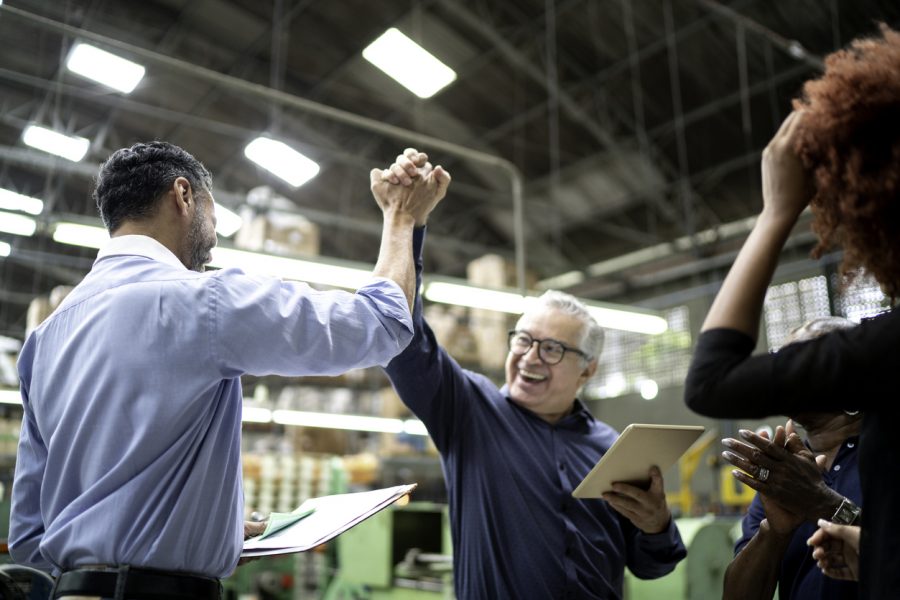 coworkers-celebrating-success