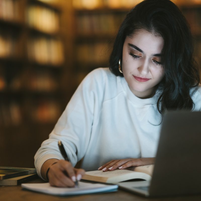 student-studying-using-laptop