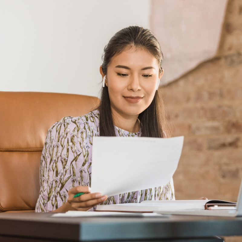 woman-reviewing-document-before-call