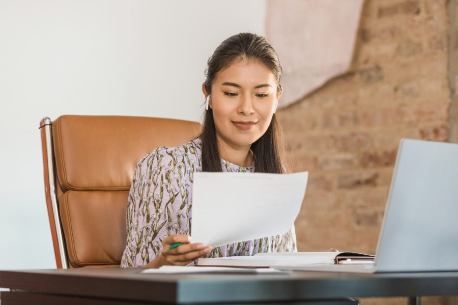 woman-reviewing-document-before-call